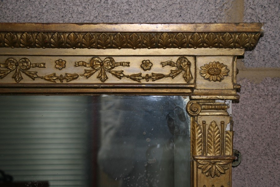 A large early 19th century gilt framed over mantle mirror, 140cms (55ins) wide.Condition Report - Image 9 of 12