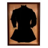 A Victorian mourning dress mounted in a glass display cabinet, overall 84 by 115cms (33 by 45.