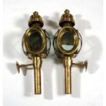 A pair of brass carriage lamps, 45cms (17.75ins) high.