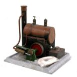 A Mamod style scratch built stationary steam engine.