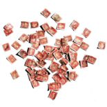 A quantity of loose Penny Red stamps.