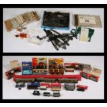 A quantity of 'OO' gauge model railway items to include carriages, buildings and track by various