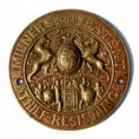 A cast brass Milner's 212 safe plaque, 20cms (8ins) diameter.