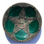 A Persian style metal mounted green glazed charger, 34cms (13.5ins) diameter.