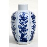 A Chinese Kangxi blue & white vase of hexagonal form decorated with flowers, 15cms (6ins) high.