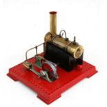 A Mamod stationary steam engine.