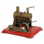 A Mamod stationary steam engine.