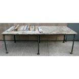 A large rectangular figured white marble topped garden table on industrial type legs, 244cms (96ins)