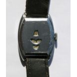 An Art Deco Swiss Jump Hour wrist watch.
