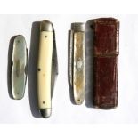 A Georgian cased silver bladed mother of pearl folding fruit knife; together with a George
