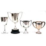 Four silver plated trophies to include boxing and motorcycling, the largest 28cms (11ins) high.