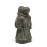 An Inuit carving depicting a mother and child, indistinct signature to underside, 13cms (5ins)