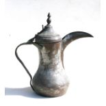 A large Turkish/Islamic tinned copper dallah coffee pot. 38cm (15 ins) high