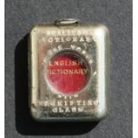 A Bryce's miniature English dictionary 'The World's Smallest Dictionary' in a metal case with