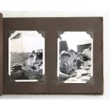 A 1930's photograph album containing photos of a Scout camp.