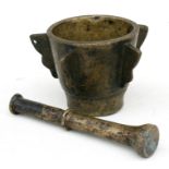 A 16th / 17th century bronze mortar and pestle, with five stepped buttresses, possibly Whitechapel