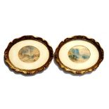 A pair of oval watercolour miniatures, one depicting a town scene with a cathedral in the