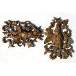 Two Black Forest style plaster wall plaques depicting hanging game, 39cms (15.25ins) high.