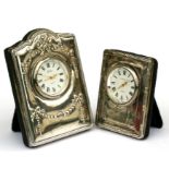 Two modern silver mounted table clocks, the largest 9cms (3.5ins) high.