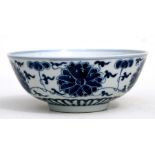 A Chinese blue & white footed bowl decorated with flowers, six character blue mark to underside,