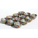 A set of twelve Chinese millefiori wine cups each depicting signs of the Chinese zodiac, 5cms (2ins)