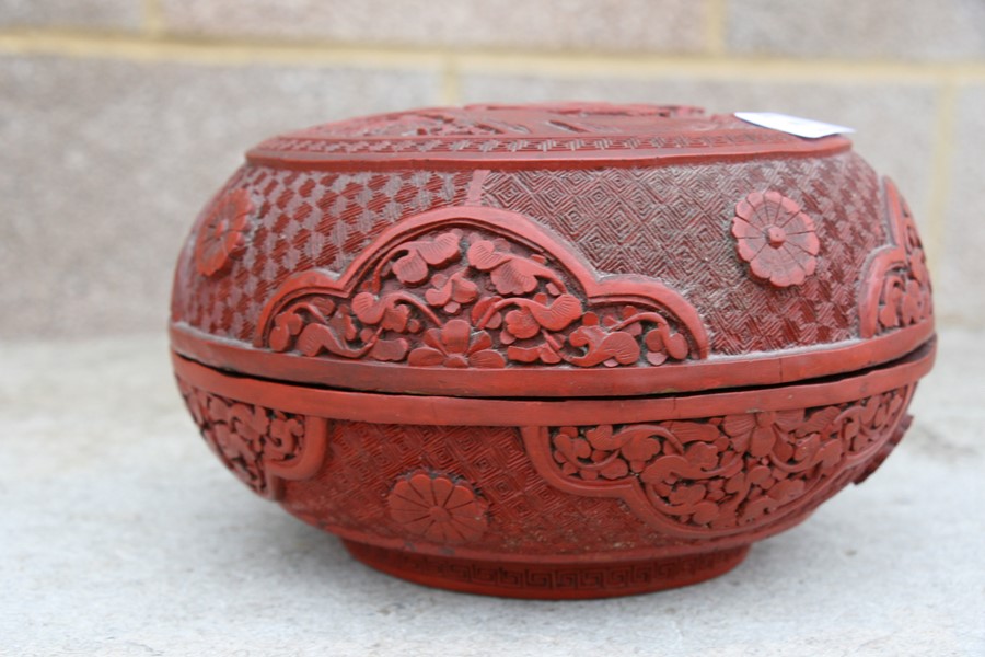 A Chinese cinnabar lacquer box & cover of compressed globular form, decorated with flowers and - Image 23 of 25