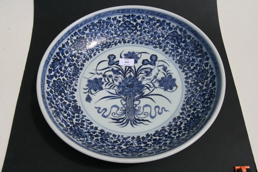 A large Chinese blue & white charger with central lotus flowers within a foliate border, 42cms (16. - Image 4 of 12