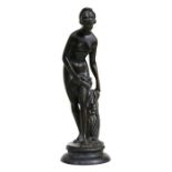 A bronze figure in the form of a naked young lady, 36cms (14.25ins) high.