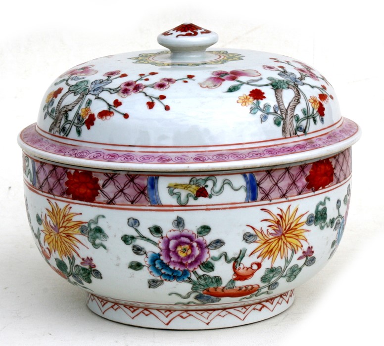 A Chinese famille rose bowl & cover decorated with flowers, six character red mark to underside,