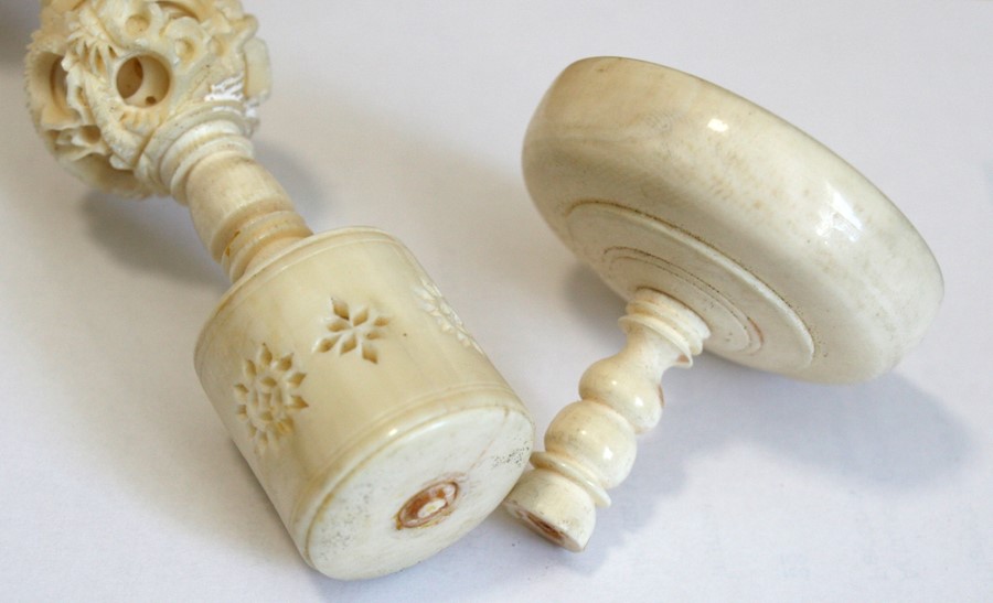 An early 20th century Chinese ivory puzzle ball on figural stand, the ball highly carved with - Image 2 of 2