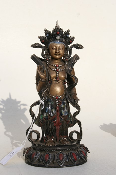 A Chinese glazed and gilded Buddhist deity figure on a hardwood lotus stand, 28cms (11ins) high. - Image 7 of 10