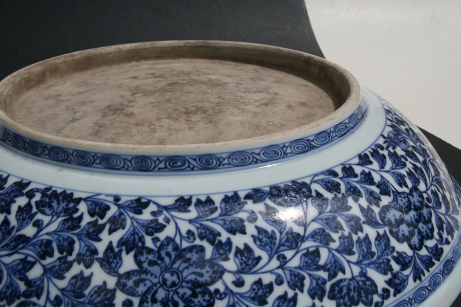 A large Chinese blue & white charger with central lotus flowers within a foliate border, 42cms (16. - Image 10 of 12