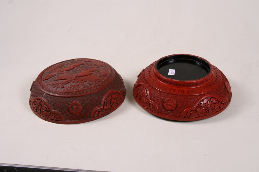 A Chinese cinnabar lacquer box & cover of compressed globular form, decorated with flowers and - Image 12 of 25
