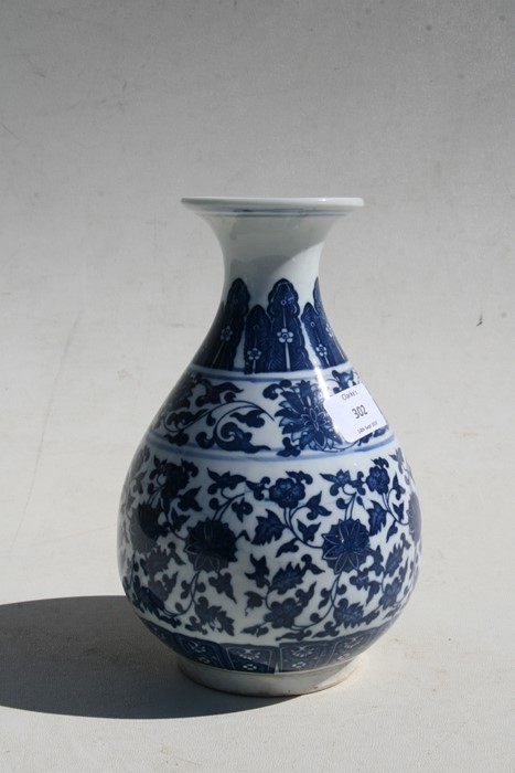 A Chinese blue & white vase decorated with foliate scrolls, six character seal mark to underside, - Image 5 of 7