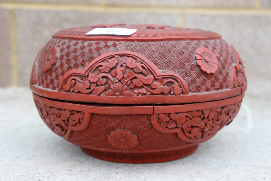 A Chinese cinnabar lacquer box & cover of compressed globular form, decorated with flowers and - Image 24 of 25