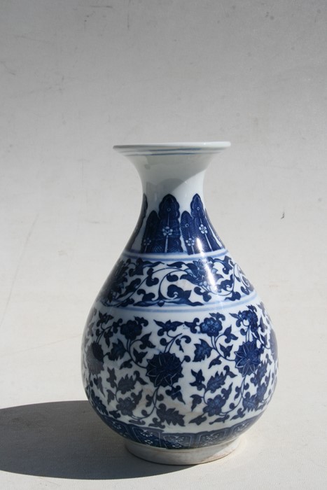 A Chinese blue & white vase decorated with foliate scrolls, six character seal mark to underside, - Image 4 of 7