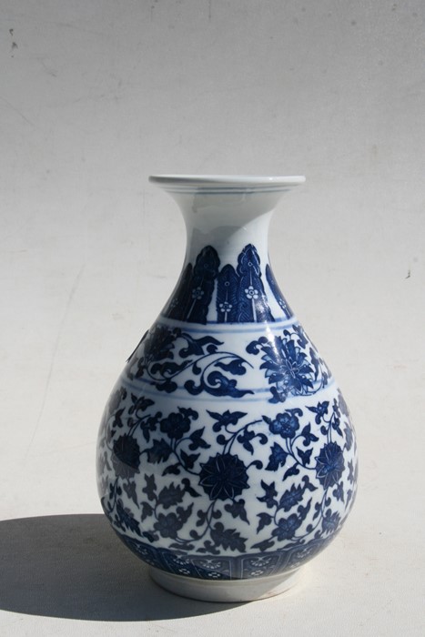 A Chinese blue & white vase decorated with foliate scrolls, six character seal mark to underside, - Image 7 of 7