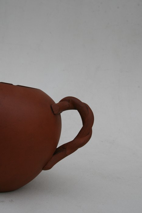 A group of three Chinese Yixing pottery teapots, the largest 18cms (7.2ins) wide.Condition Report - Image 11 of 11