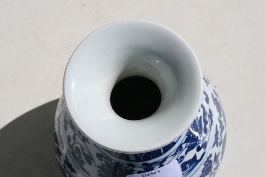 A Chinese blue & white vase decorated with foliate scrolls, six character seal mark to underside, - Image 2 of 7