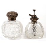 A silver topped cut glass scent bottle of globular form; together with a silver topped cut glass