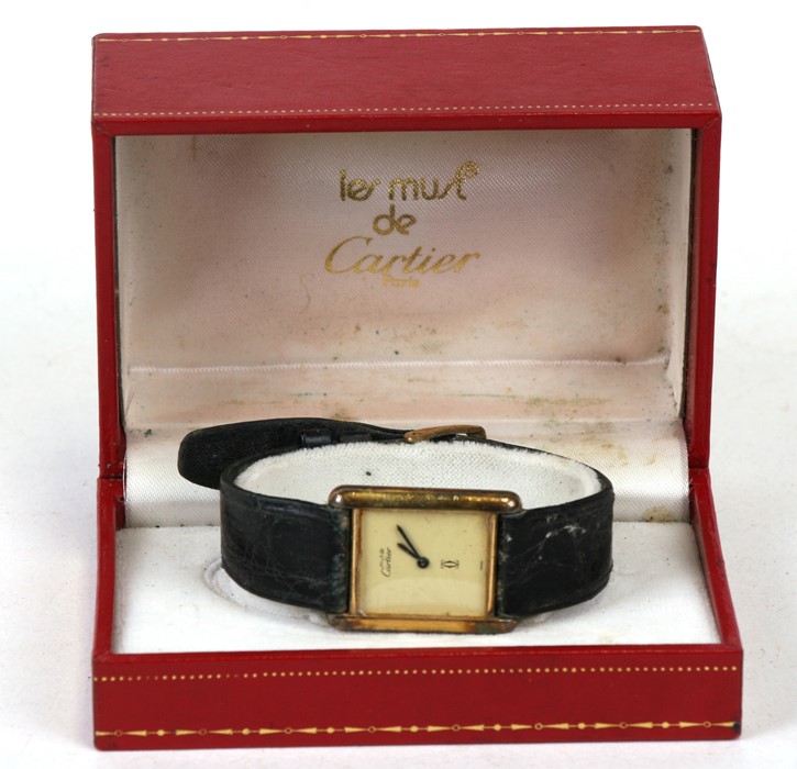 A 1980's Must de Cartier tank silver gilt wrist watch, numbered '095187', in original box.