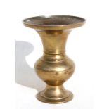 A Chinese polished bronze vase, 19cms (7.5ins) high; together with a Chinese bronze vase with