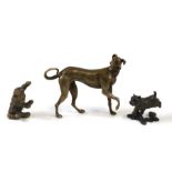 A group of bronze animals to include a greyhound, a terrier, and a cat, the largest 6cms (2.25ins)