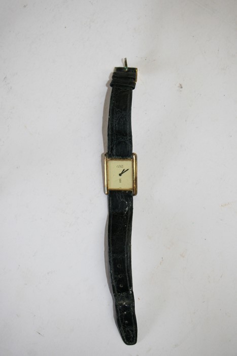 A 1980's Must de Cartier tank silver gilt wrist watch, numbered '095187', in original box. - Image 7 of 7