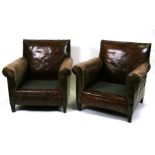 A pair of Edwardian leather club armchairs.