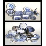 A quantity of transfer printed blue & white china; together with a pair of alabaster table lamps and