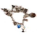 A silver charm bracelet and charms, total weight 46g.