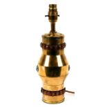 A brass fireman's hose nozzle converted to a table lamp, 22cms (8.5ins) high.