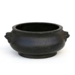 A Chinese bronze censer with lion mask handles, six-character mark to underside, 12.5cms (5.5ins)