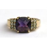 A 9ct gold amethyst set dress ring, approx UK size 'R'.